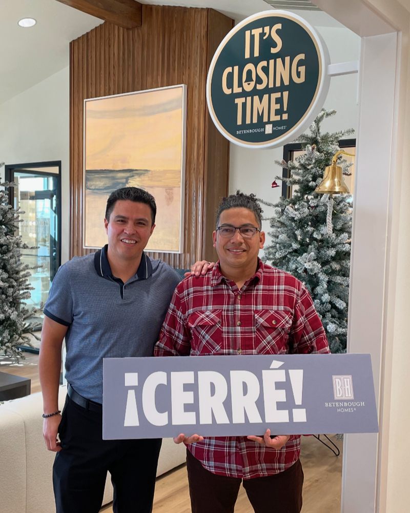 Perea Mortgage client celebrating his home closing with a Cerré sign